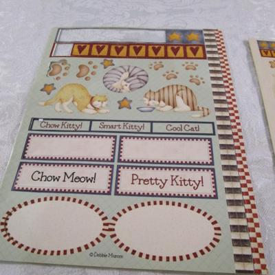 Sale Photo Thumbnail #91: Stickers, rubber stamp, ornament, small picture frame, Minnie Mouse sunglasses, jeans extenders, scrapbooking supplies, necklace extenders, fingernail stickers, see pictures