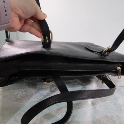 Sale Photo Thumbnail #228: Has shoulder strap & key strap & built-in cord, 12" tall x 16-3/4" wide, sells for $35.98 on Amazon