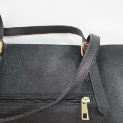 Sale Photo Thumbnail #218: Has shoulder strap & key strap & built-in cord, 12" tall x 16-3/4" wide, sells for $35.98 on Amazon