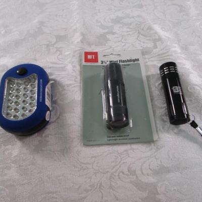 Sale Photo Thumbnail #284: Mini flashlights take 3 AAA batteries not included, work light takes AAA batteries, See pictures