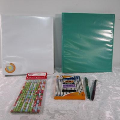 Sale Photo Thumbnail #552: 2 binders (one with 50 sheet protectors & one with 38 sheet protectors); 1 new pkg pencils, 1 new box of 10 Bic pens, 2 additional pens