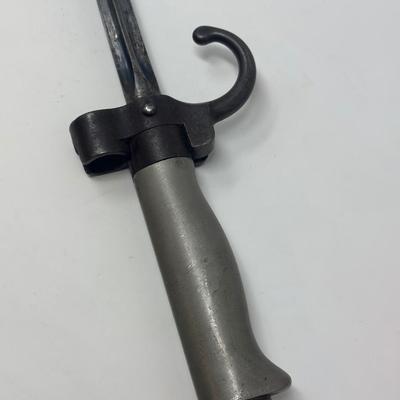 Sale Photo Thumbnail #300: An early M 1886 Lebel Bayonet produced for the French Army. Overall length 25 3/4”