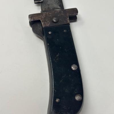 Sale Photo Thumbnail #307: Original WWII US Pilot's folding survival machete.
Overall length 15 1/2”