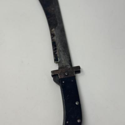 Sale Photo Thumbnail #306: Original WWII US Pilot's folding survival machete.
Overall length 15 1/2”