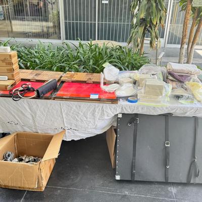 Sale Photo Thumbnail #2: This is the kind of set up you need to sell at a crafts show booth. You get the large fabric to cover the tables, a large gold and glass show case with mirror back in its carrying case. a large glass case, 22X24  and the hardware to put it together. high 