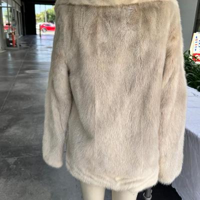 Sale Photo Thumbnail #66: Emilio Gucci Vintage Blond Mink Ladies Fur Coat tagged with Herberts of San Francisco White Fur is in great condition, satin  lining has a rip. Contrast lapel and pockets.I have no proof, that this is a real Gucci, there is no serial number as the jacket 