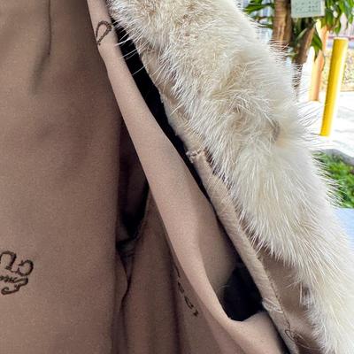 Sale Photo Thumbnail #62: Emilio Gucci Vintage Blond Mink Ladies Fur Coat tagged with Herberts of San Francisco White Fur is in great condition, satin  lining has a rip. Contrast lapel and pockets.I have no proof, that this is a real Gucci, there is no serial number as the jacket 