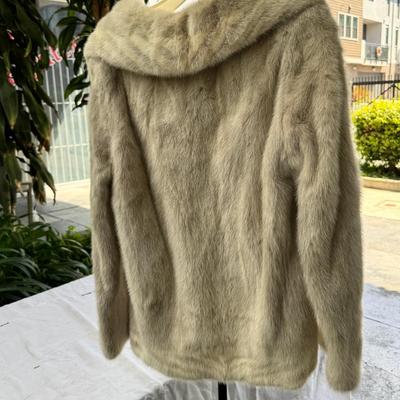 Sale Photo Thumbnail #57: Emilio Gucci Vintage Blond Mink Ladies Fur Coat tagged with Herberts of San Francisco White Fur is in great condition, satin  lining has a rip. Contrast lapel and pockets.I have no proof, that this is a real Gucci, there is no serial number as the jacket 