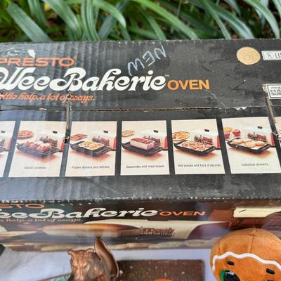 Sale Photo Thumbnail #99: silk scarves, Ceramic Toby, TY Ginger bear, 1940s crib, 1940s shoe horns, vintage containers.