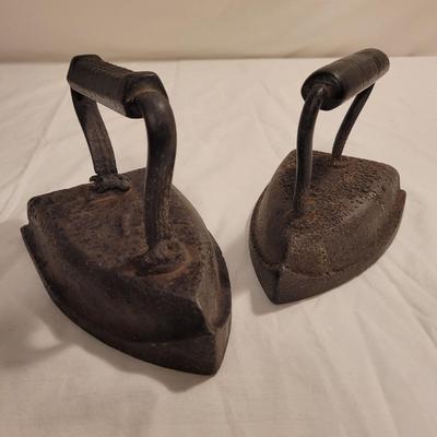 Two Antique Cast Iron Sad Irons (FE-EL)