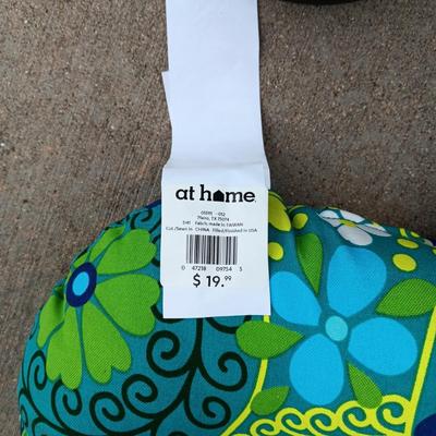 2 NEW CHAIR CUSHIONS AND SOME FLOWER POTS