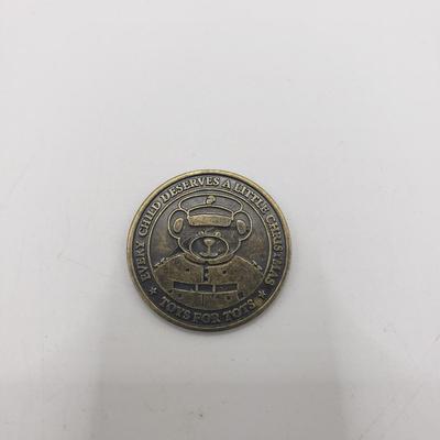 LOT 129F: Novelty Santa Dollar, $2 Bill & Marine Corps Toys for Tots Coin