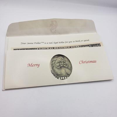 LOT 129F: Novelty Santa Dollar, $2 Bill & Marine Corps Toys for Tots Coin