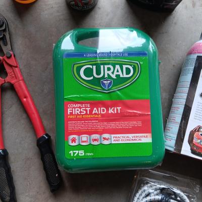 NEW FIRST AID KIT AND FW1 AUTO CLEANING WAS PLUS BOLT CUTTERS, HAMMER AND CHEMICALS