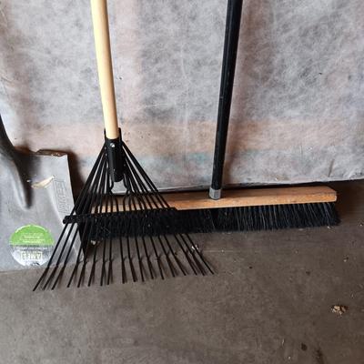 YARD TOOLS, PARTIAL BAG OF FERTILIZER AND A PUSH BROOM