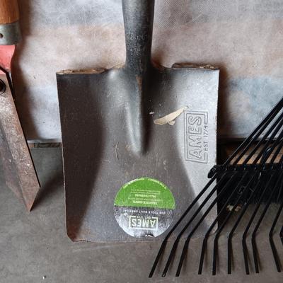 YARD TOOLS, PARTIAL BAG OF FERTILIZER AND A PUSH BROOM