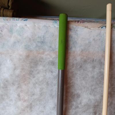 YARD TOOLS, PARTIAL BAG OF FERTILIZER AND A PUSH BROOM