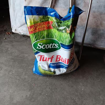 YARD TOOLS, PARTIAL BAG OF FERTILIZER AND A PUSH BROOM