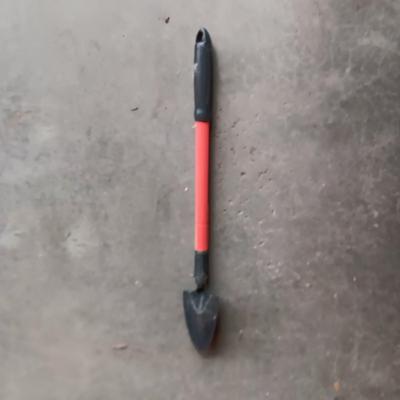 YARD TOOLS, PARTIAL BAG OF FERTILIZER AND A PUSH BROOM