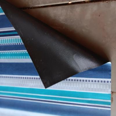 NEW RUBBER BACK AREA RUG OR WORK OUT MAT