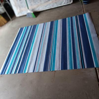 NEW RUBBER BACK AREA RUG OR WORK OUT MAT