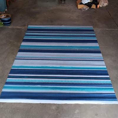 NEW RUBBER BACK AREA RUG OR WORK OUT MAT