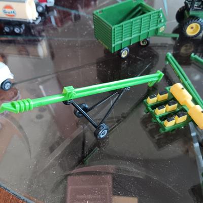 SMALL JOHN DEERE TOY FARMING EQUIPMENT (ABOUT THE SIZE OF A HOT WHEEL)