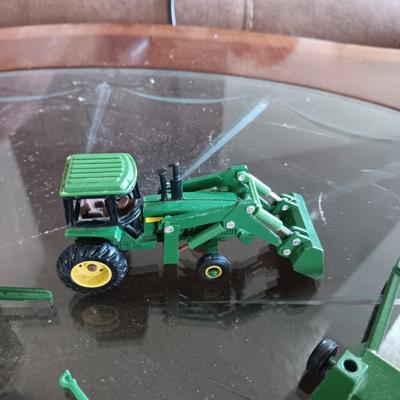 SMALL JOHN DEERE TOY FARMING EQUIPMENT (ABOUT THE SIZE OF A HOT WHEEL)