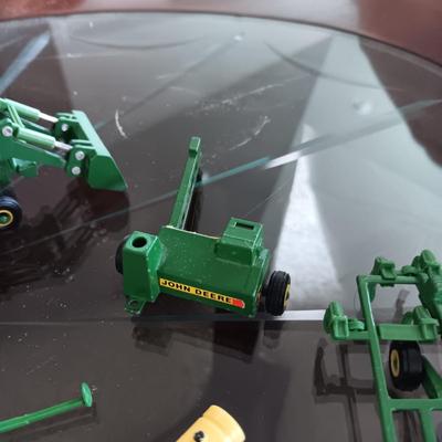 SMALL JOHN DEERE TOY FARMING EQUIPMENT (ABOUT THE SIZE OF A HOT WHEEL)