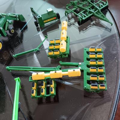 SMALL JOHN DEERE TOY FARMING EQUIPMENT (ABOUT THE SIZE OF A HOT WHEEL)
