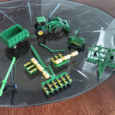 SMALL JOHN DEERE TOY FARMING EQUIPMENT (ABOUT THE SIZE OF A HOT WHEEL)