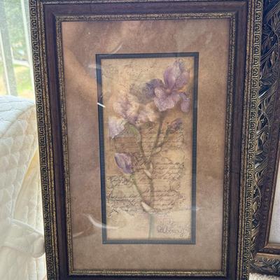 Two framed art pieces, with the larger one identified as a framed watercolor painting.