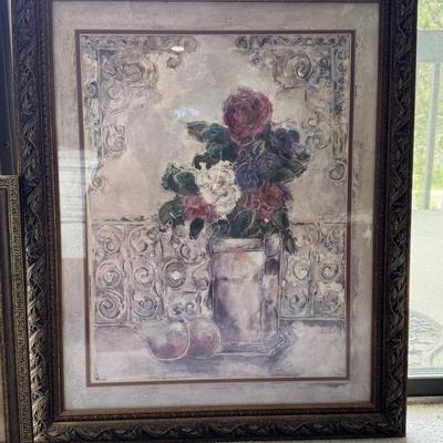 Two framed art pieces, with the larger one identified as a framed watercolor painting.