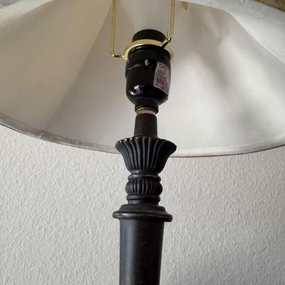 Two table lamps and artificial Monstera Plant.