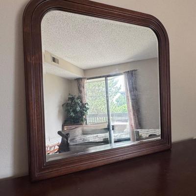 Designer dresser with six drawers and mirror.