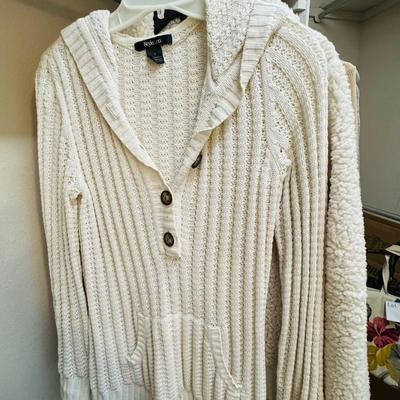 Sweaters size small.
