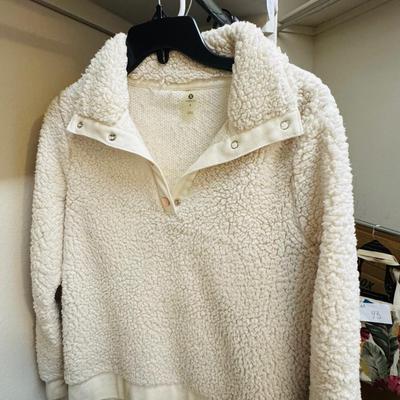 Sweaters size small.