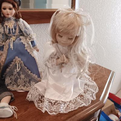 4 PORCELAIN DOLLS