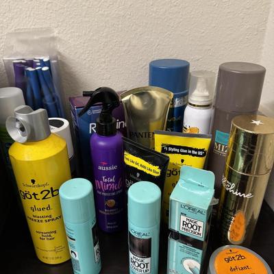Collection of hair care and styling products.
