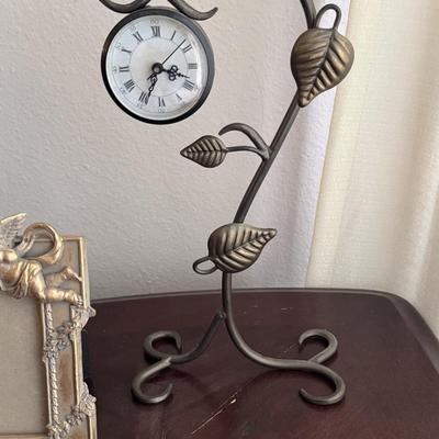 End table with home decor items.