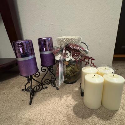 Candle stands and candles.