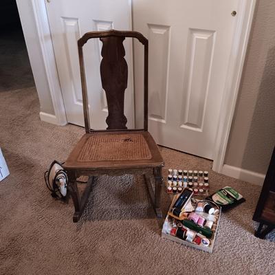 ANTIQUE SEWING ROCKER WITH CANED SEAT AND NOTIONS