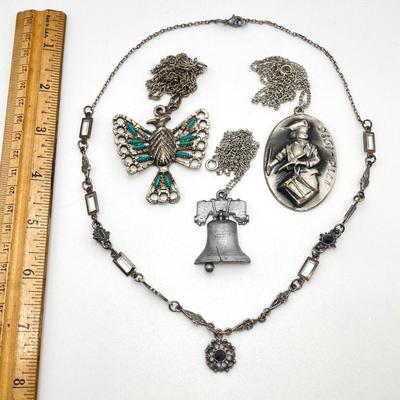 LOT 108: Collection of Silver Tone Pendant Necklaces