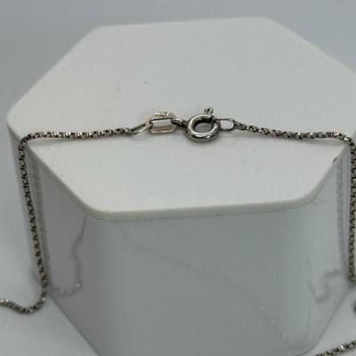 LOT 109: 16” 925 Diamond Cut Chain with Circle Pendant