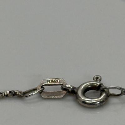 LOT 109: 16” 925 Diamond Cut Chain with Circle Pendant