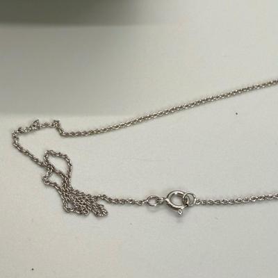 LOT 113 Sterling Cross & 151/2” Necklace 1.4g, Diamond Snowflake 925 Sterling 18” Necklace and Sterling Bell Pin 4.6 gtw