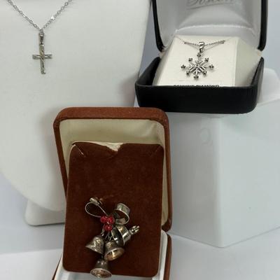 LOT 113 Sterling Cross & 151/2” Necklace 1.4g, Diamond Snowflake 925 Sterling 18” Necklace and Sterling Bell Pin 4.6 gtw