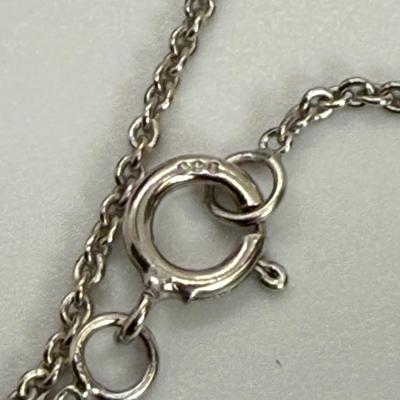 LOT 113 Sterling Cross & 151/2” Necklace 1.4g, Diamond Snowflake 925 Sterling 18” Necklace and Sterling Bell Pin 4.6 gtw