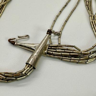 LOT 114: 17” Native American Graduated Liquid Silver Sterling Silver Necklace and Pierced Earrings