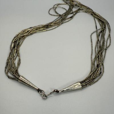 LOT 114: 17” Native American Graduated Liquid Silver Sterling Silver Necklace and Pierced Earrings